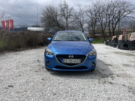 ������ Mazda 2