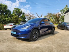 ������ Tesla Model Y
