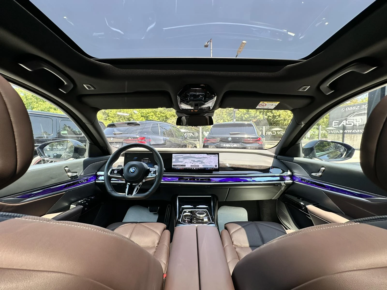 BMW 750 E xDrive / PANO / CAMERA 360 / HUD / TV /FULL, снимка 12 - Автомобили и джипове - 54078022