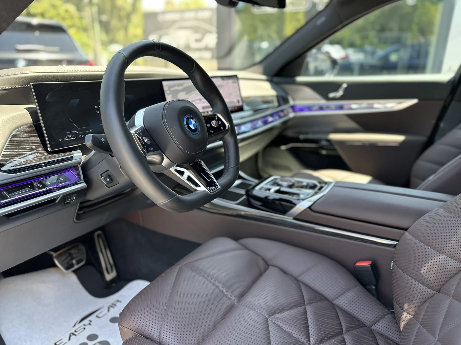 BMW 750 E xDrive / PANO / CAMERA 360 / HUD / TV /FULL, снимка 7 - Автомобили и джипове - 54078022