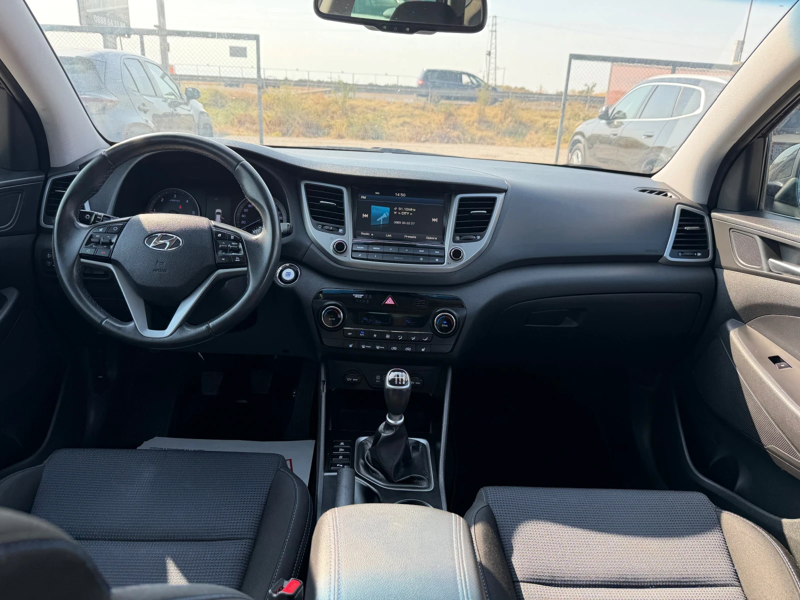 Hyundai Tucson 1.7 CRDI, снимка 14 - Автомобили и джипове - 56265524