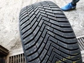 Гуми Всесезонни 245/45R18, снимка 1 - Гуми и джанти - 40472552