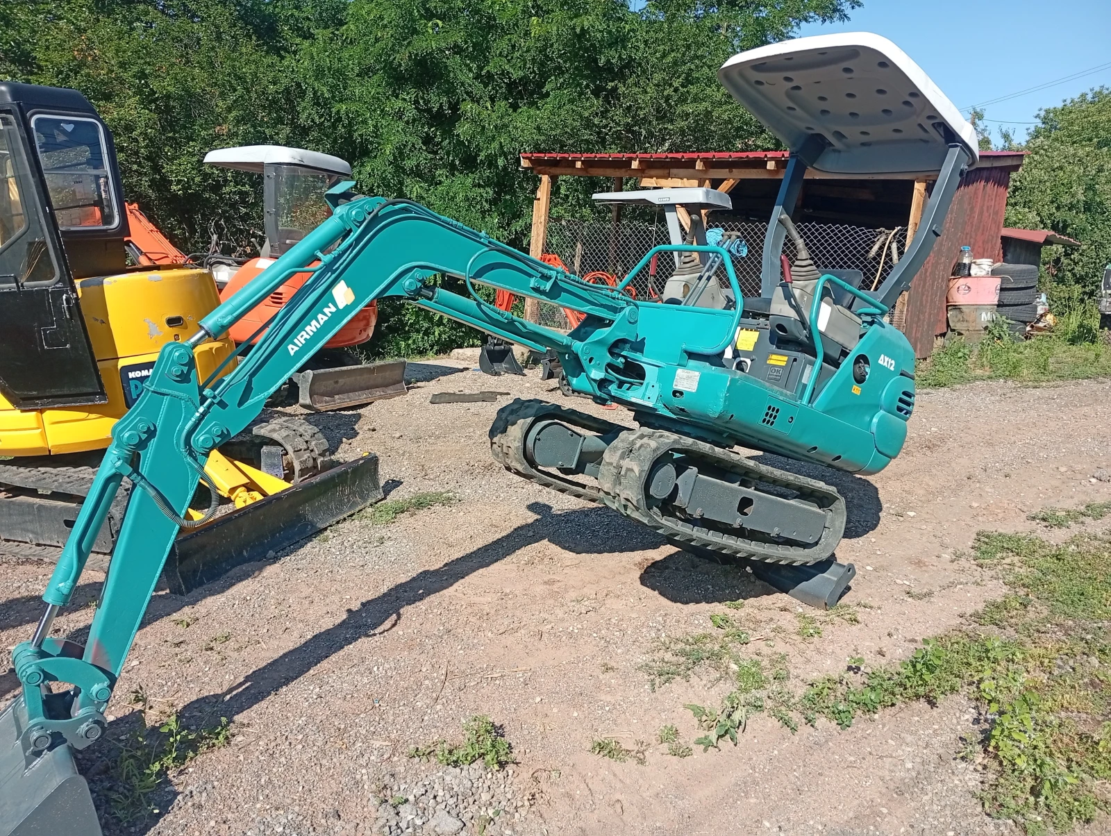 Багер Hitachi AX 12