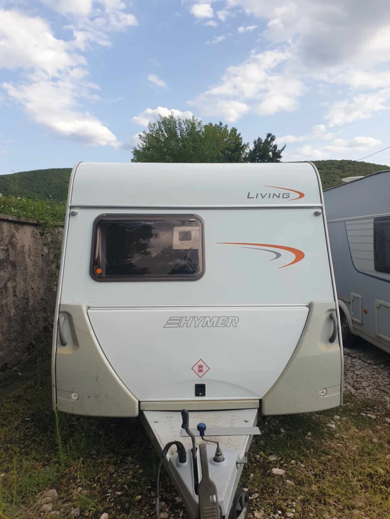 Каравана HYMER / ERIBA LIVING 560, снимка 1 - Каравани и кемпери - 46936804