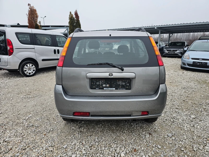 Suzuki Ignis 1.3 БЕНЗИН 4x4 ! ! РЕАЛНИ КИЛОМЕТРИ, снимка 4 - Автомобили и джипове - 48495685