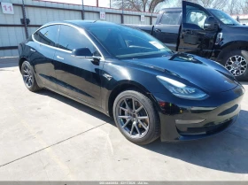 ������ Tesla Model 3