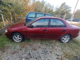 Mazda 323, снимка 1