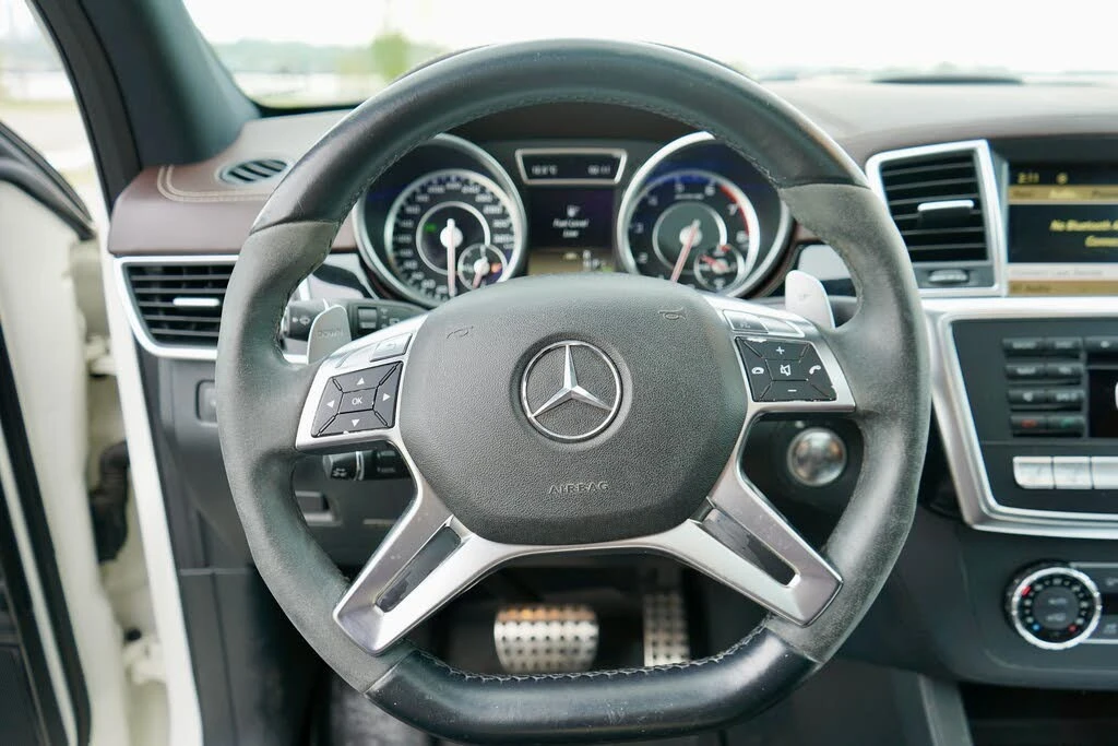 Mercedes-Benz ML 63 AMG DISTRONIC/4MATIC/KEYLESS/ОБДУХВАНЕ, снимка 12 - Автомобили и джипове - 54552884