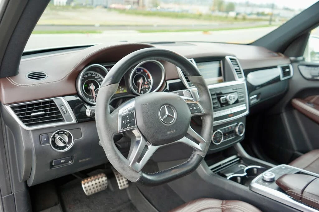 Mercedes-Benz ML 63 AMG DISTRONIC/4MATIC/KEYLESS/ОБДУХВАНЕ, снимка 11 - Автомобили и джипове - 54552884