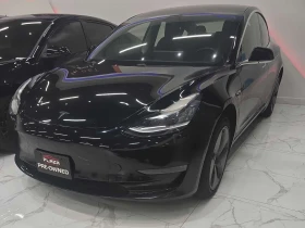 ������ Tesla Model 3