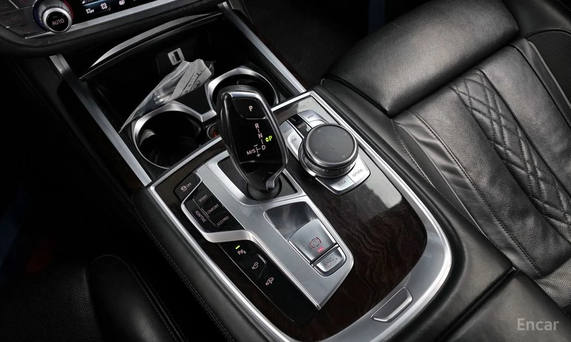 BMW 750 Li xDrive* BOWERS & WILKINS* HEAD-UP* 360 CAM* TV , снимка 14 - Автомобили и джипове - 54009089