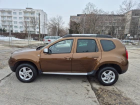     Dacia Duster 1.6i -  