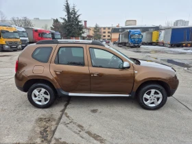     Dacia Duster 1.6i -  