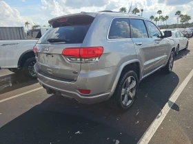 Jeep Grand cherokee 5.7 Overland/Крайна цена с вс. такси до България ! - [4] 