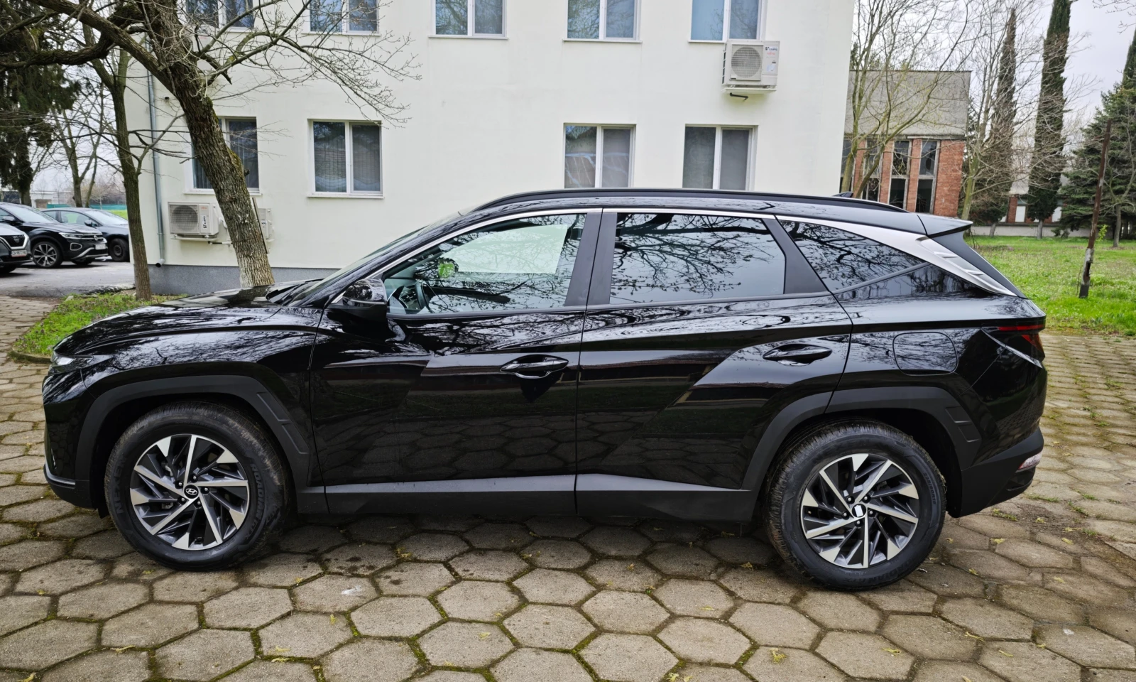 Hyundai Tucson 2.0 CRDI, снимка 8 - Автомобили и джипове - 54056370