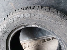 Гуми Зимни 215/65R16, снимка 3 - Гуми и джанти - 39136238