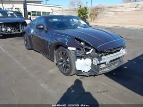 Nissan 370Z 3.7L V6 FI DOHC 24V NF4 Rear Wheel Drive 1