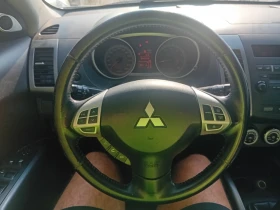 Mitsubishi Outlander 2.4 7места 4х4, снимка 13