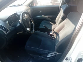Mitsubishi Outlander 2.4 7места 4х4, снимка 14