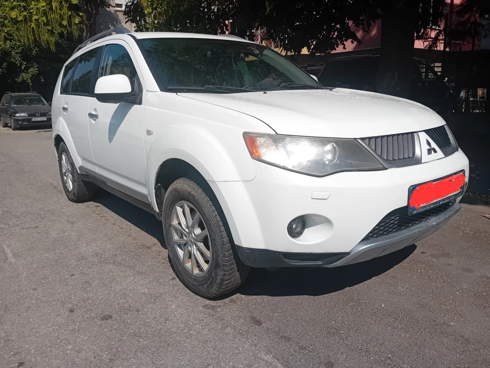 Mitsubishi Outlander 2.4 7места 4х4, снимка 2 - Автомобили и джипове - 56097145