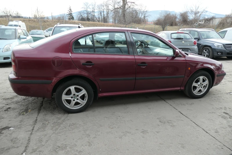 Skoda Octavia 1.9TDI 90кс SLX КЛИМАТИК ДЖАНТИ, снимка 6 - Автомобили и джипове - 47267778