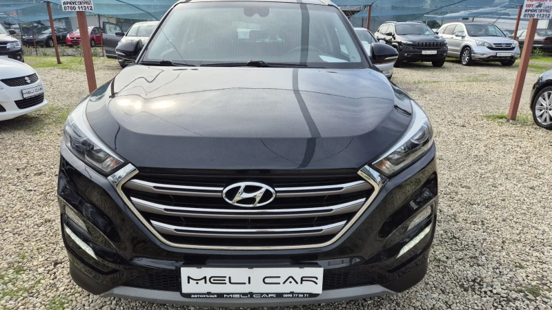 Hyundai Tucson 1.7CRDI НАВИ КАМЕРА КАПАРИРАН , снимка 1 - Автомобили и джипове - 47614796