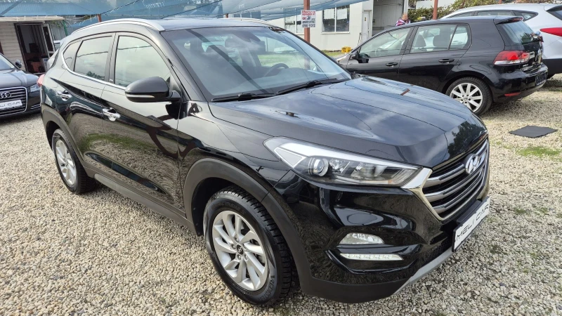 Hyundai Tucson 1.7CRDI НАВИ КАМЕРА КАПАРИРАН , снимка 2 - Автомобили и джипове - 47614796