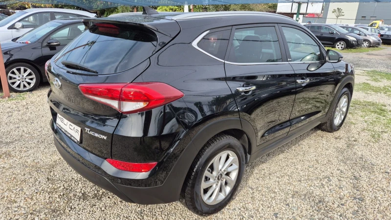 Hyundai Tucson 1.7CRDI НАВИ КАМЕРА КАПАРИРАН , снимка 6 - Автомобили и джипове - 47614796