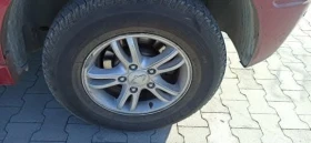 Гуми с джанти Bridgestone 235/70R16, снимка 1