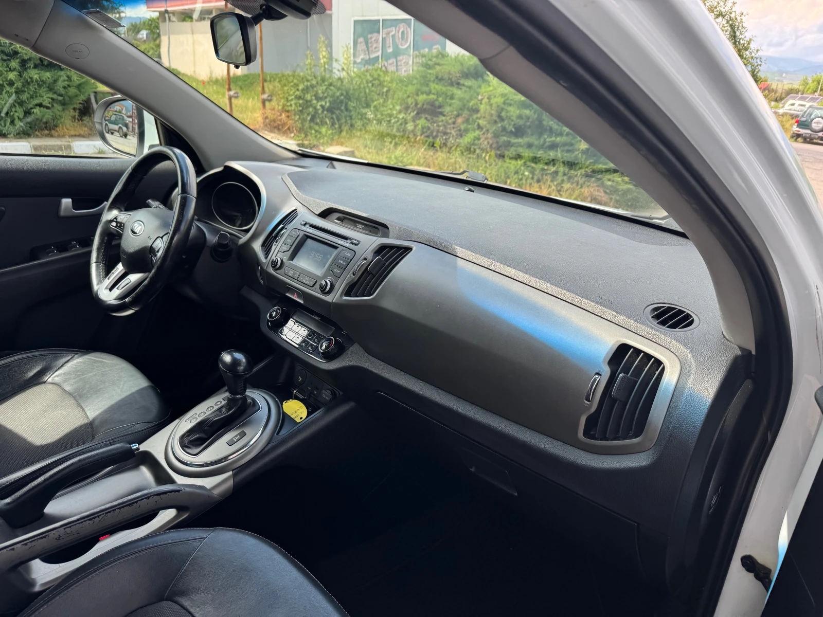 Kia Sportage 2.0 CRDI REBEL 4x4 EURO 5B, снимка 11 - Автомобили и джипове - 54751044
