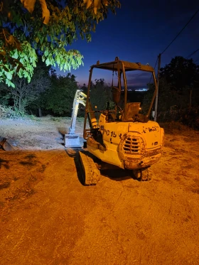 Багер Komatsu PC15R