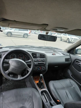 Nissan Primera 2.0, снимка 13
