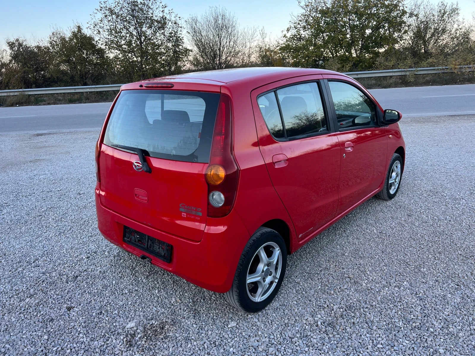 Daihatsu Cuore 1.0 I 70 к.с. FACE - изображение 5