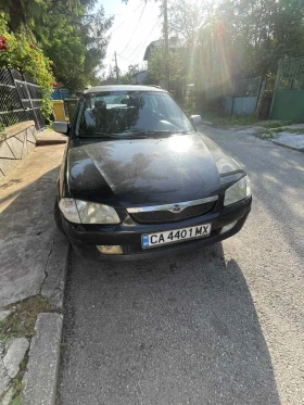 Mazda 323, снимка 1