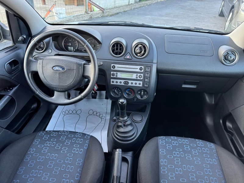 Ford Fiesta 1.2i-Ghia, снимка 11 - Автомобили и джипове - 48337765