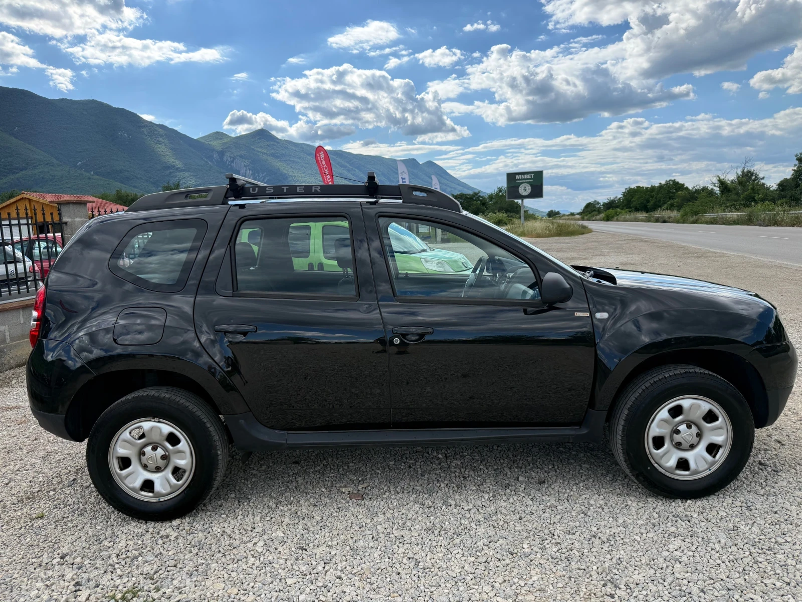Dacia Duster 1.6 I 105 k.с. УНИКАТ, снимка 6 - Автомобили и джипове - 54895011