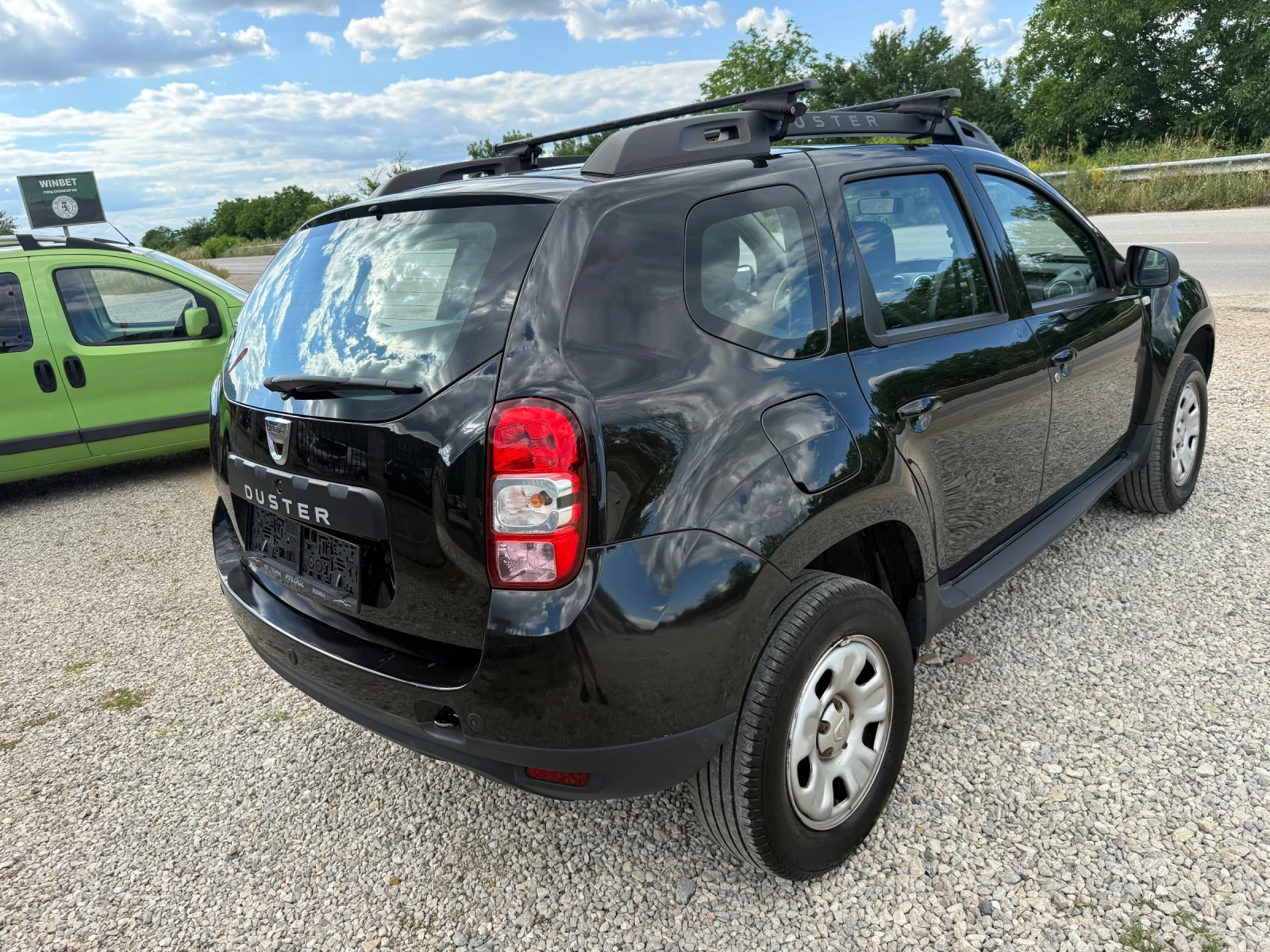 Dacia Duster 1.6 I 105 k.с. УНИКАТ, снимка 5 - Автомобили и джипове - 54895011