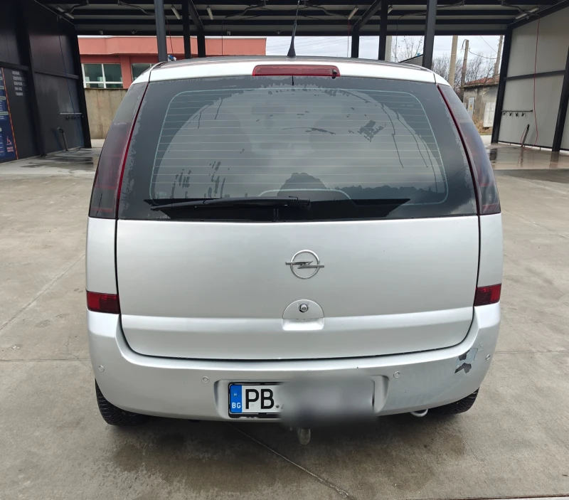 Opel Meriva 1.6 Газ, снимка 11 - Автомобили и джипове - 49471496