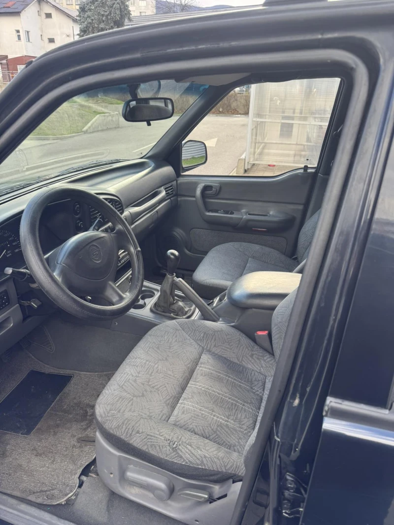 SsangYong Musso 2.9, снимка 10 - Автомобили и джипове - 53034449