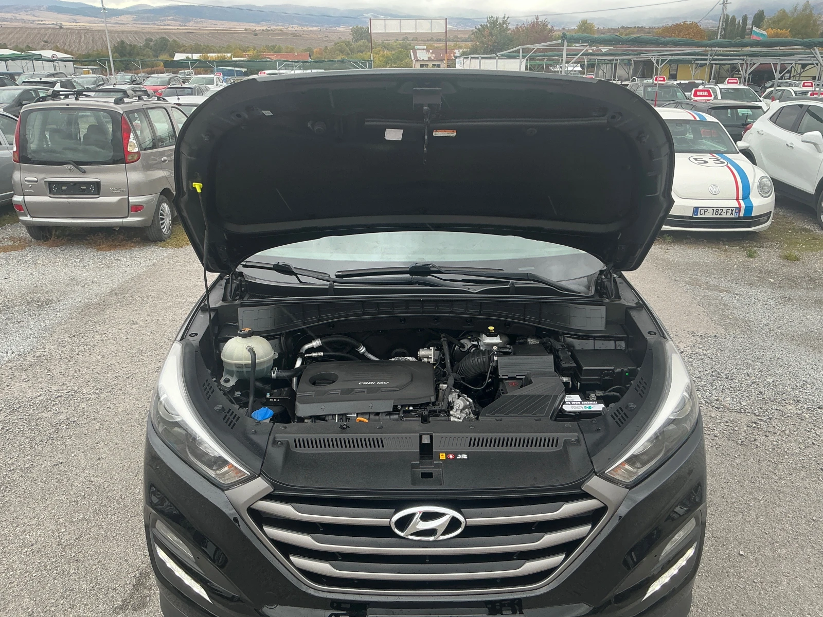 Hyundai Tucson 1.7 CRDI, снимка 9 - Автомобили и джипове - 56140912