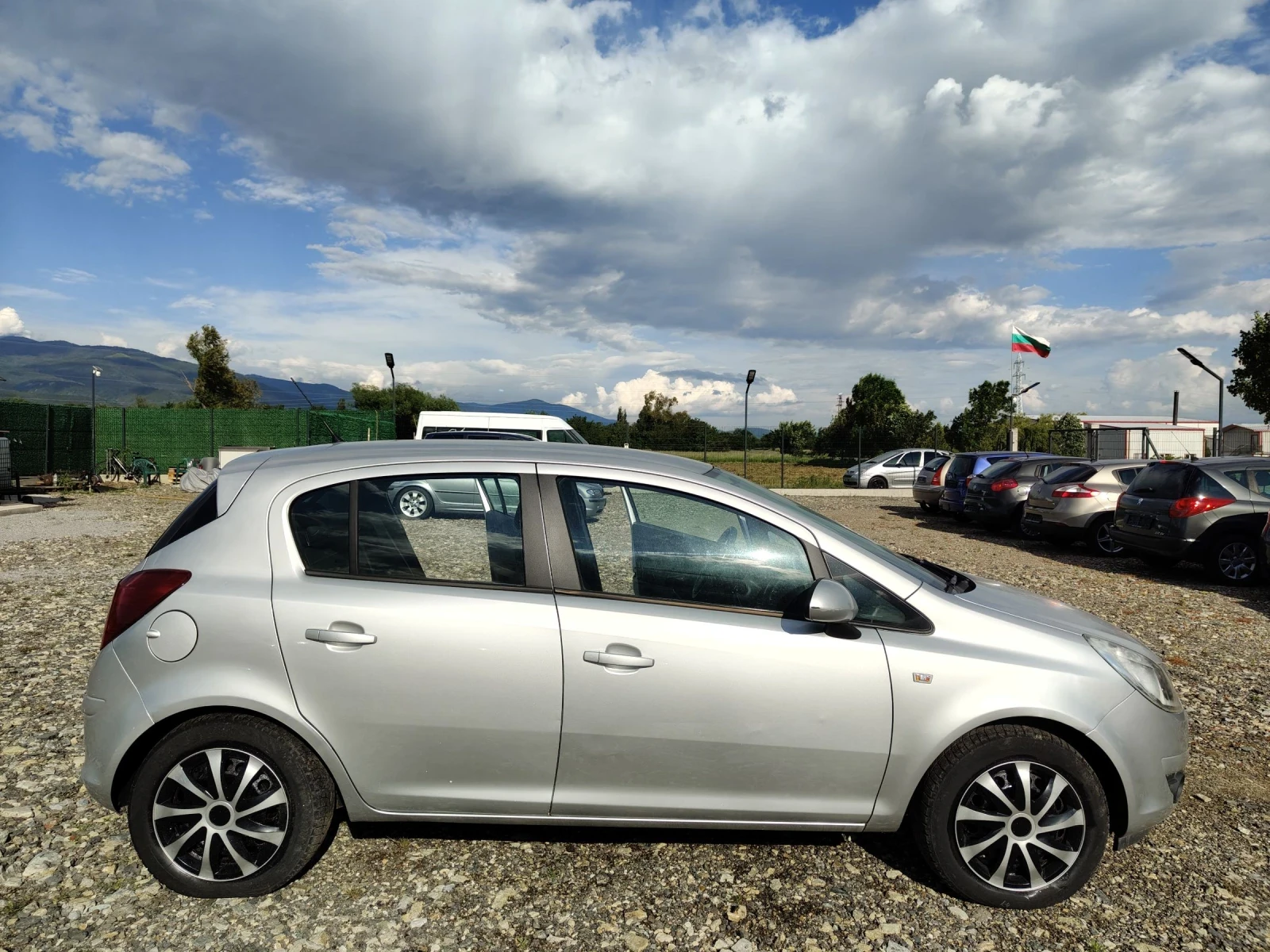 Opel Corsa 1.4i 90 COSMO xenon , снимка 7 - Автомобили и джипове - 54391569