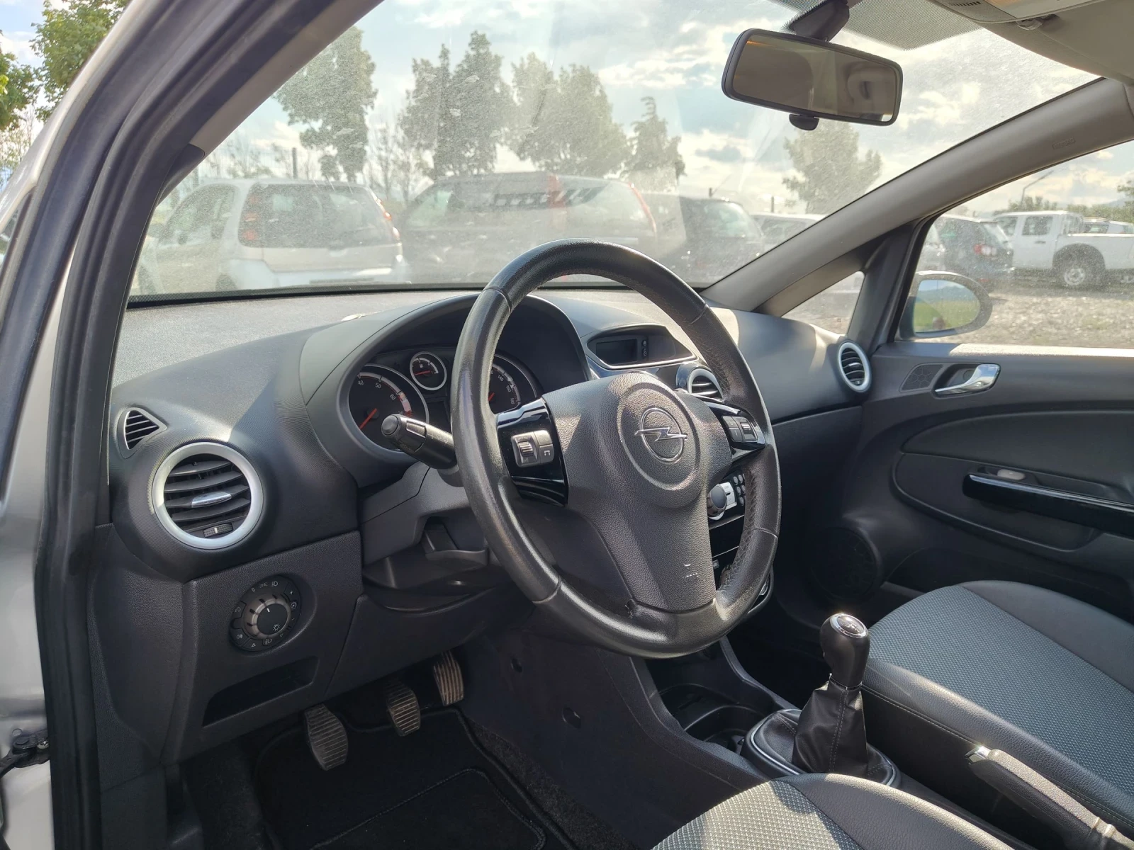 Opel Corsa 1.4i 90 COSMO xenon , снимка 10 - Автомобили и джипове - 54391569