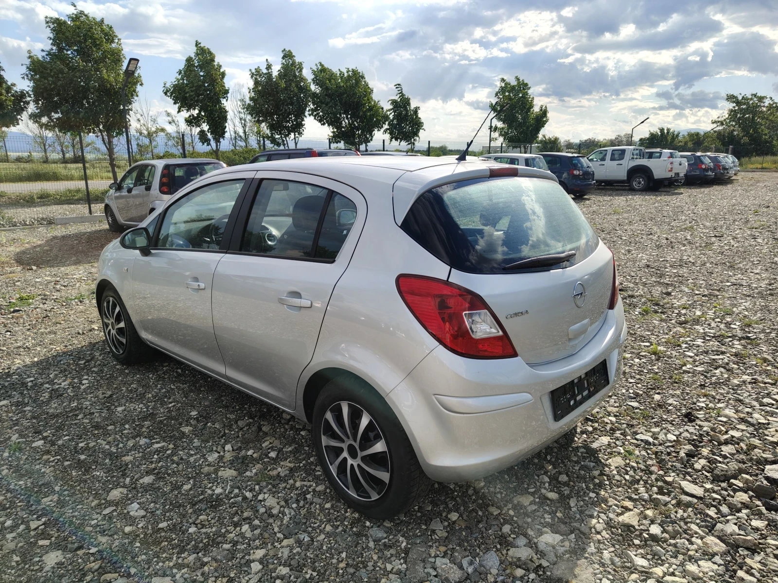 Opel Corsa 1.4i 90 COSMO xenon , снимка 4 - Автомобили и джипове - 54391569