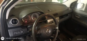 Mazda 2 faselift, снимка 11