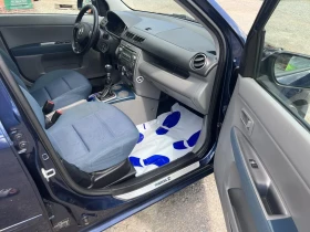 Mazda 2 1.25i, снимка 13