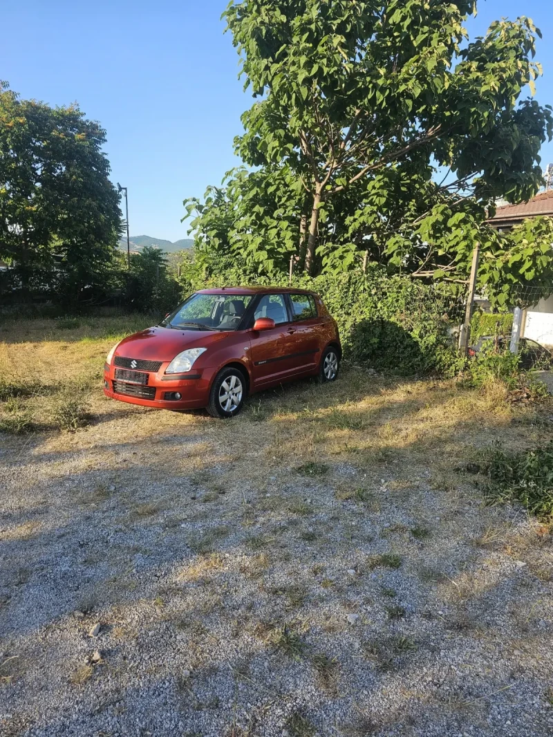 Suzuki Swift 1.3 Климатик, снимка 10 - Автомобили и джипове - 50807278