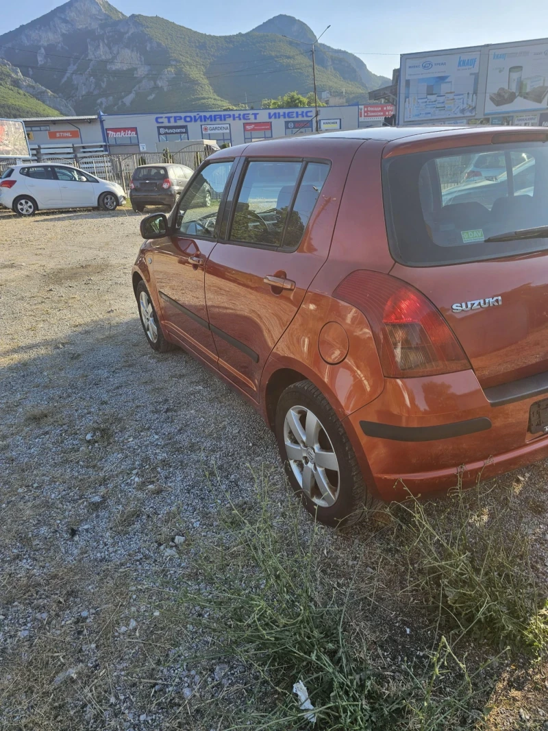 Suzuki Swift 1.3 Климатик, снимка 9 - Автомобили и джипове - 50807278
