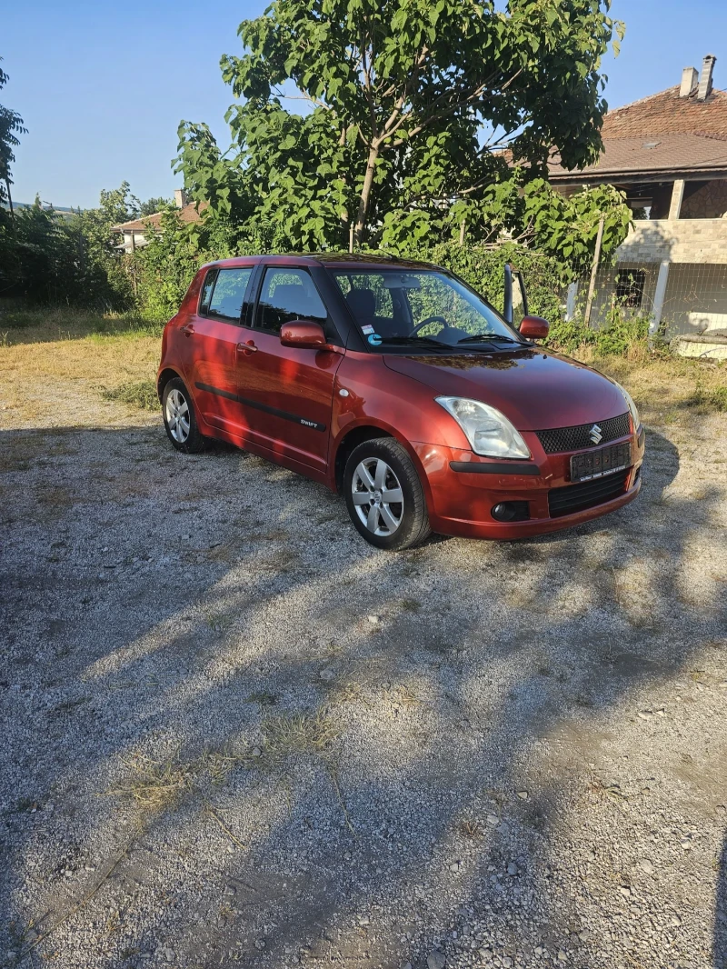 Suzuki Swift 1.3 Климатик, снимка 11 - Автомобили и джипове - 50807278