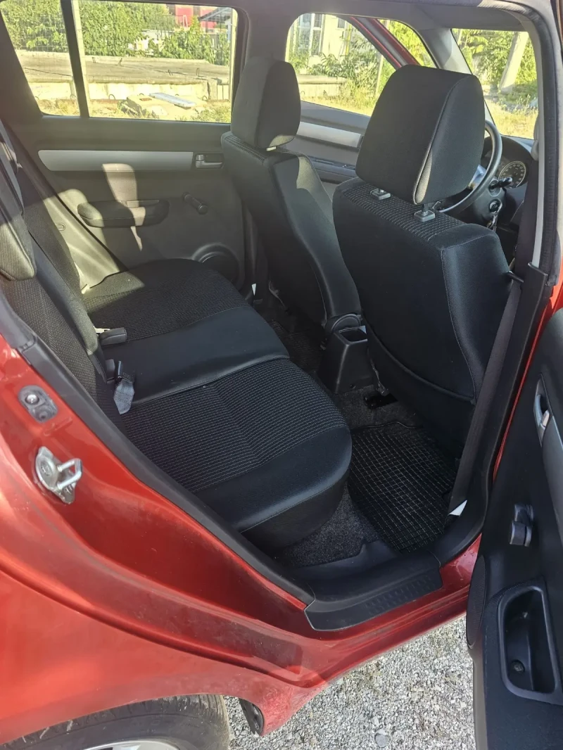 Suzuki Swift 1.3 Климатик, снимка 12 - Автомобили и джипове - 50807278