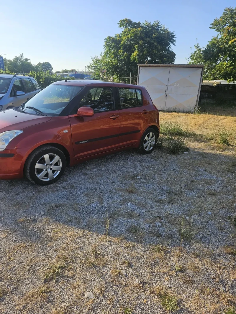 Suzuki Swift 1.3 Климатик, снимка 8 - Автомобили и джипове - 50807278